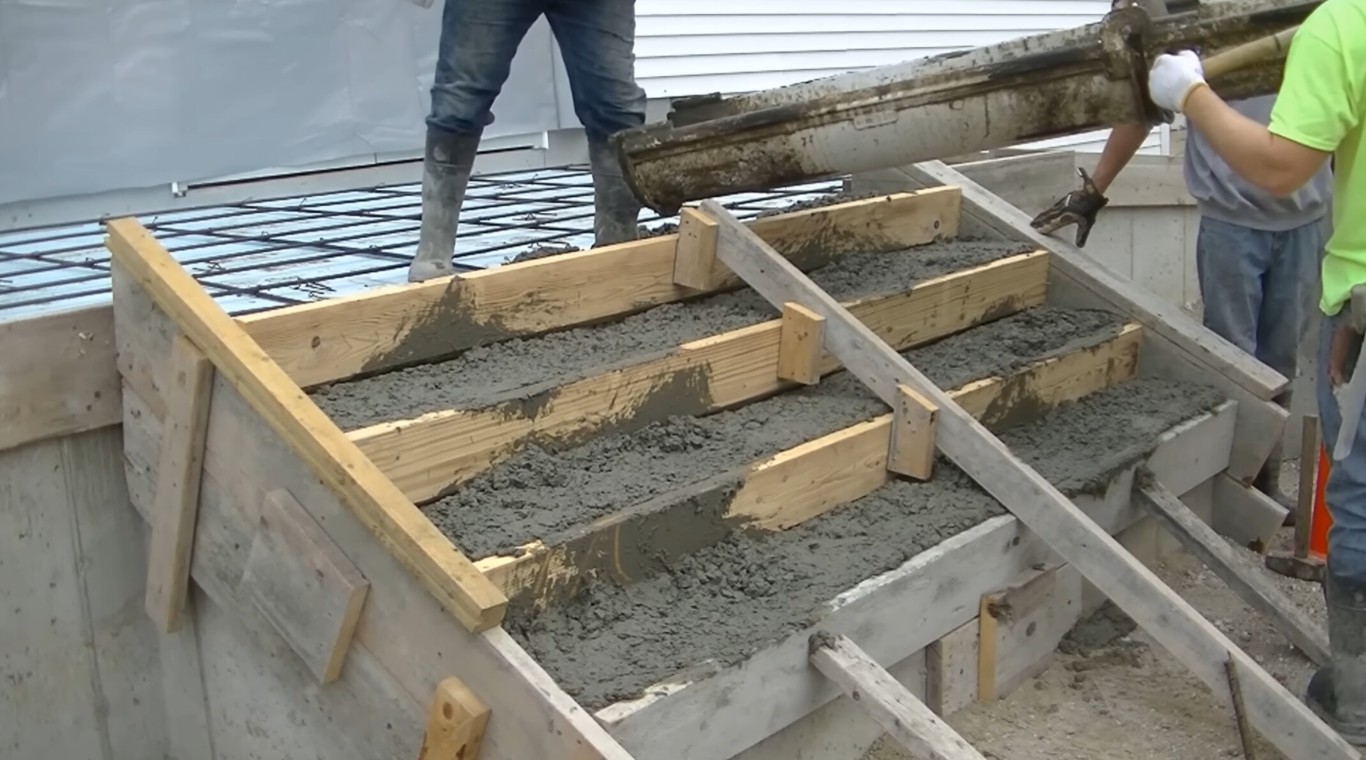 Concrete steps and stairs construction with wooden forms and rebar support
